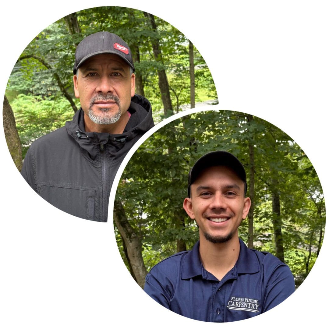 Two men wearing hats, smiling outdoors with green trees in the background.